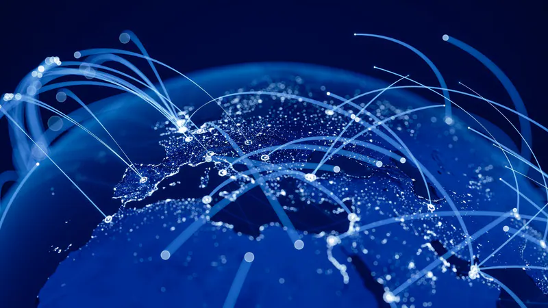 Blue globe with luminous connections linking markets