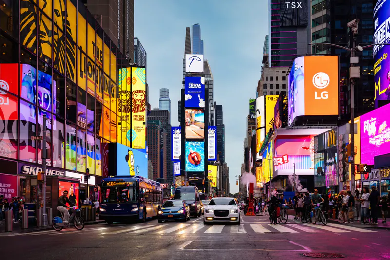 Colorful brand billboards and digital advertising above the streets of Times Square